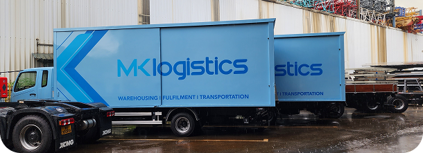MK Logistics trucks at the yard